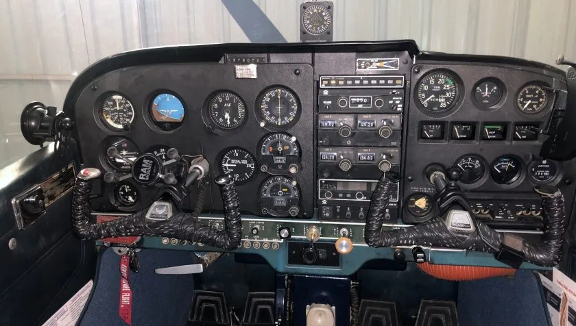 Cockpit and instrument panel of a 1969 Cessna 172K 57861.