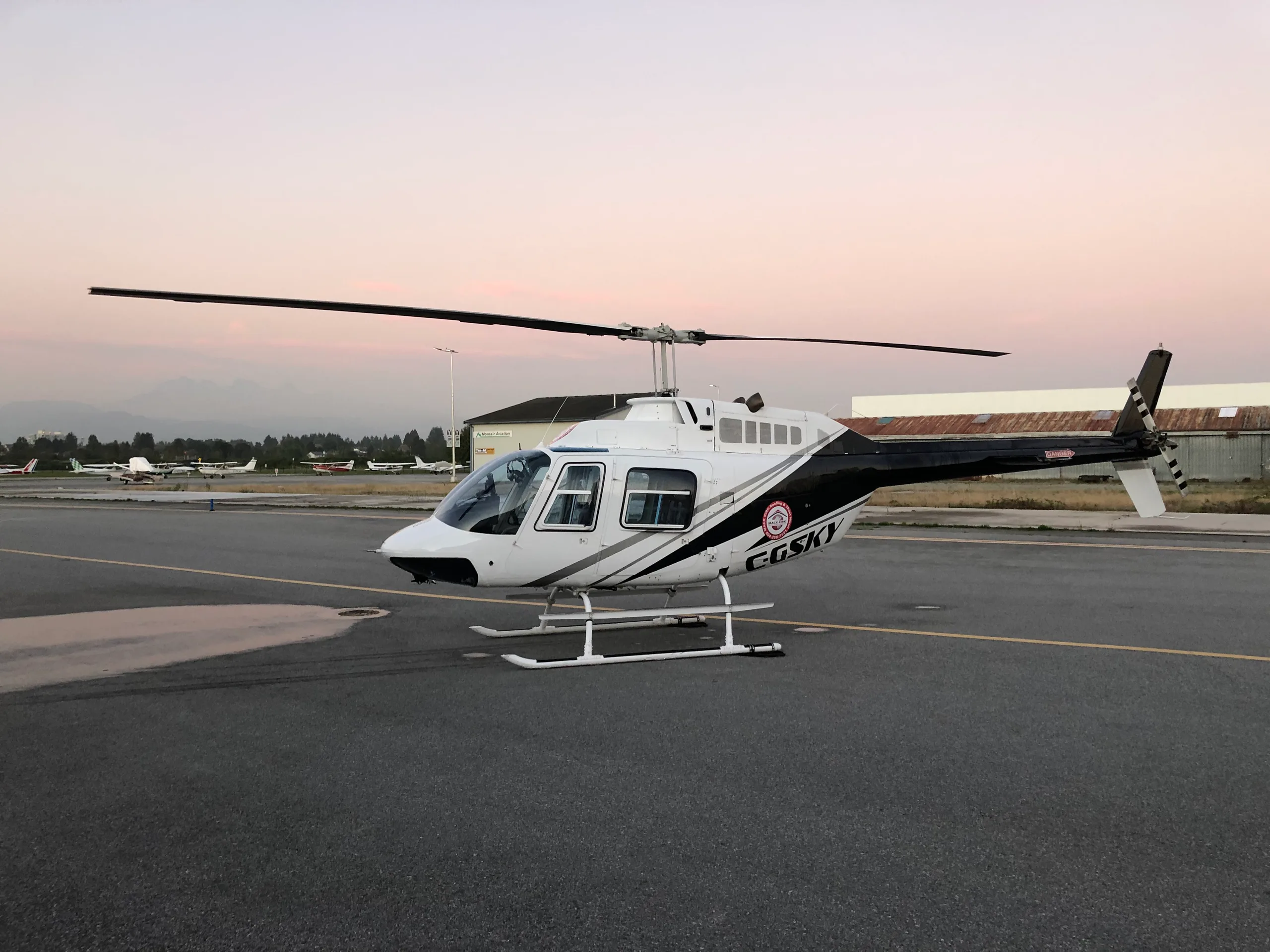 Exterior view of a 1971 Bell 206B 612, C-GWKY.