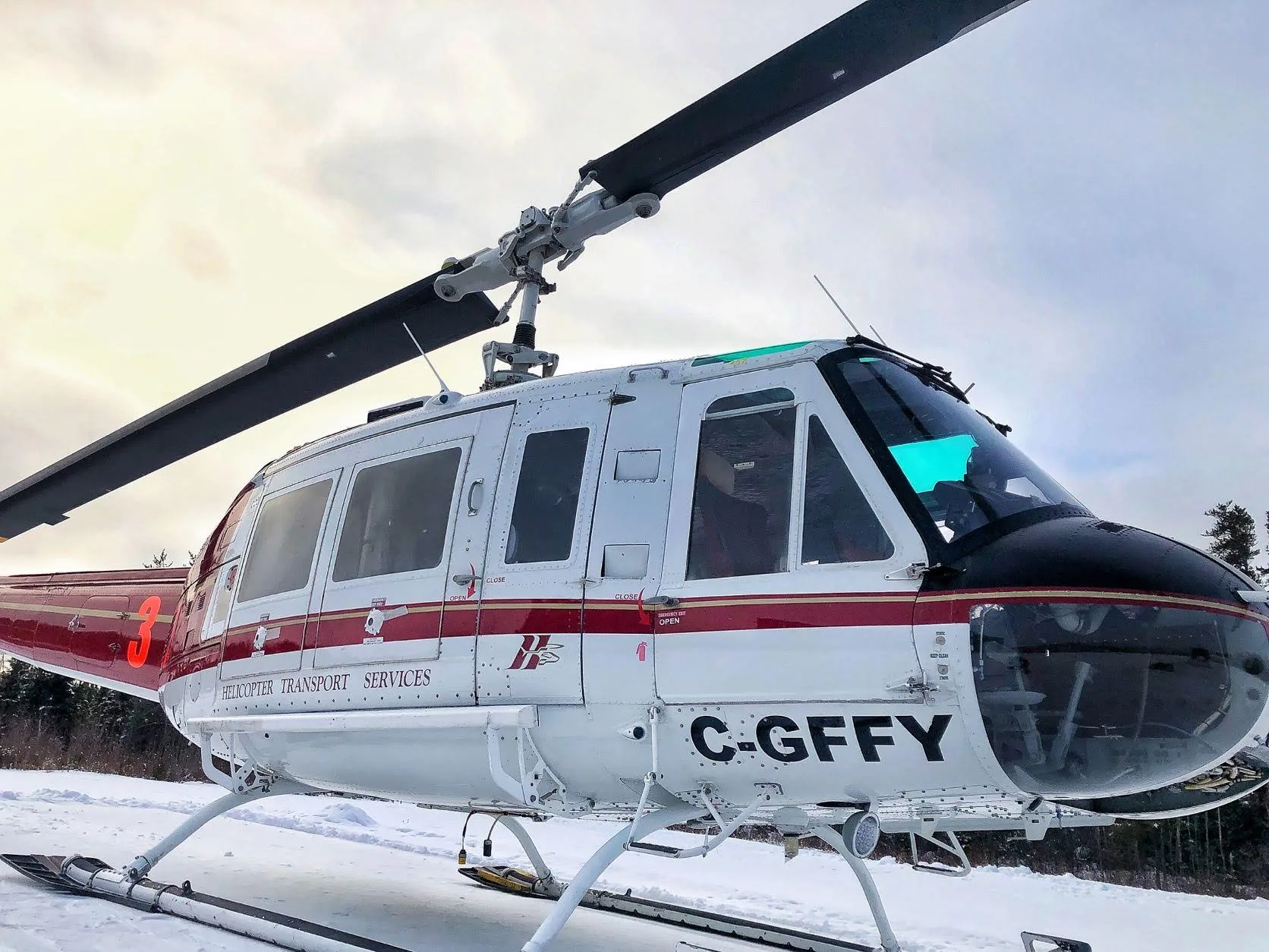 Exterior view of a 1973 Bell 205A1 30123, C-GFFY.