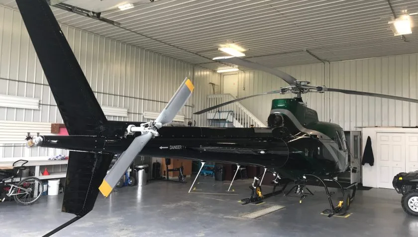 Exterior view of a 1980 Eurocopter AS350B2 1297, C-GYWB.