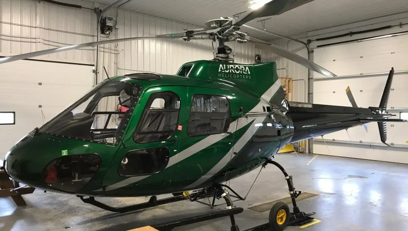 Exterior view of a 1980 Eurocopter AS350B2 1297, C-GYWB.