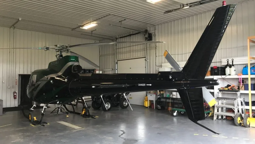 Exterior view of a 1980 Eurocopter AS350B2 1297, C-GYWB.