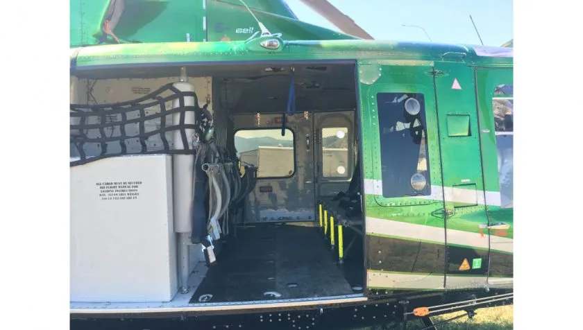 Exterior view of a 1983 Bell 412 33103, C-FXWB.
