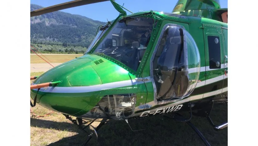 Exterior view of a 1983 Bell 412 33103, C-FXWB.