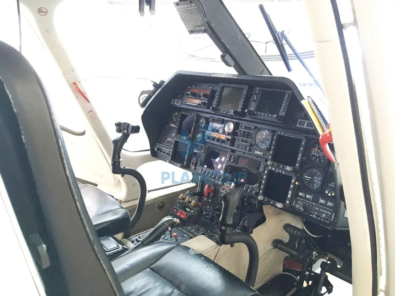 Cockpit and instrument panel of a 2006 Agusta Westland A109E Power.