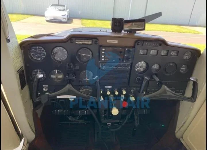 Cockpit and instrument panel of a 1966 Cessna 150G.