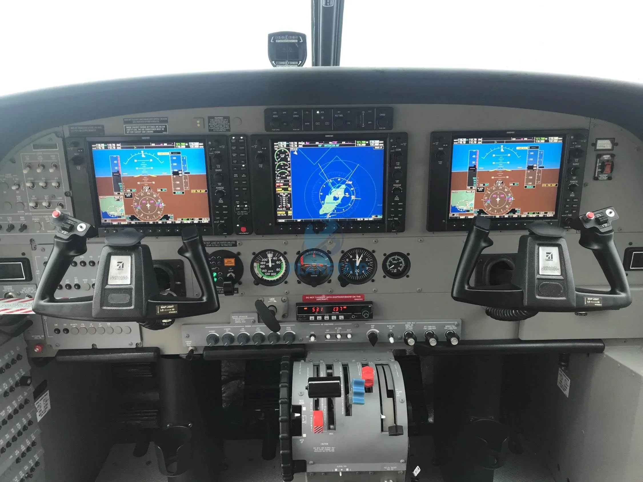 Cockpit and instrument panel of a 2015 Cessna CARAVAN EX AMPHIBIAN 208B.