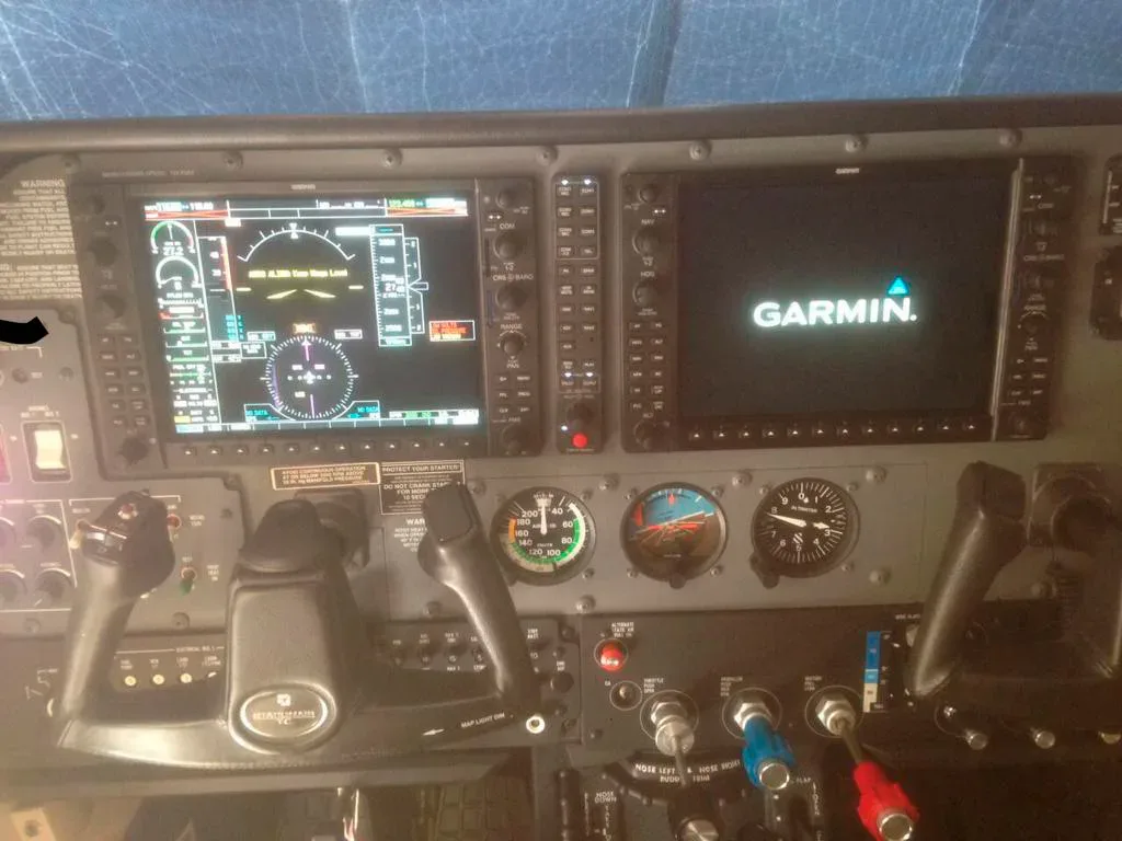 Cockpit and instrument panel of a 2010 Cessna T206H Stationair.