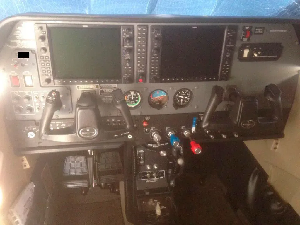 Cockpit and instrument panel of a 2010 Cessna T206H Stationair.