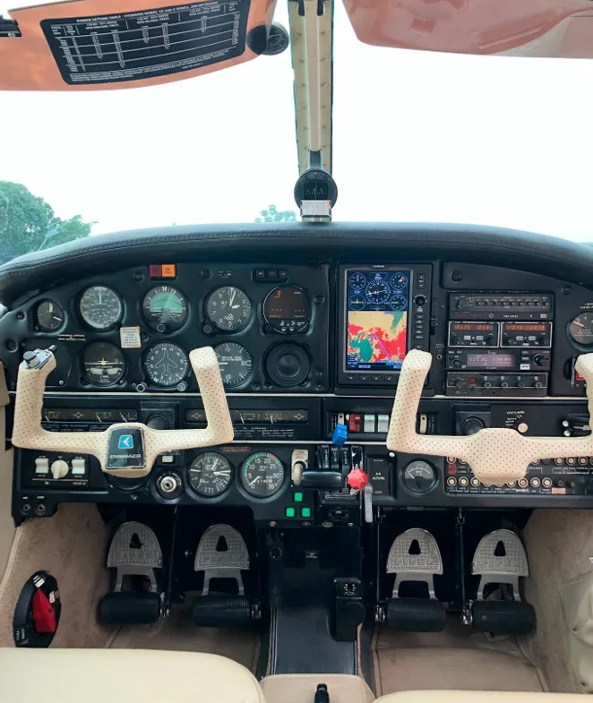 Cockpit and instrument panel of a 1977 Embraer Corisco.