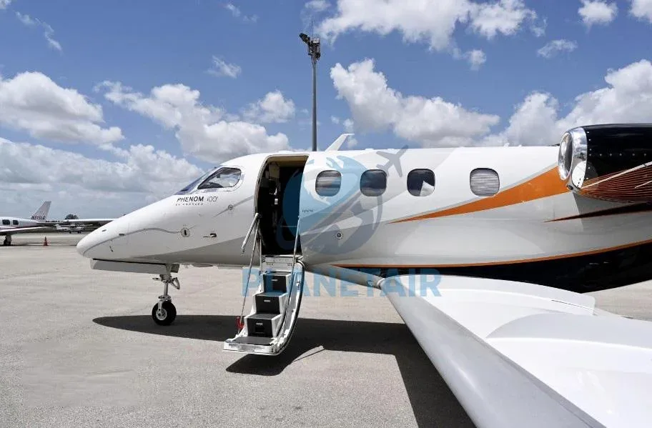Exterior view of a 2011 Embraer Phenom 100.