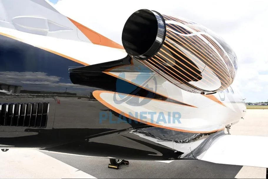 Marketing image of a 2011 Embraer Phenom 100.