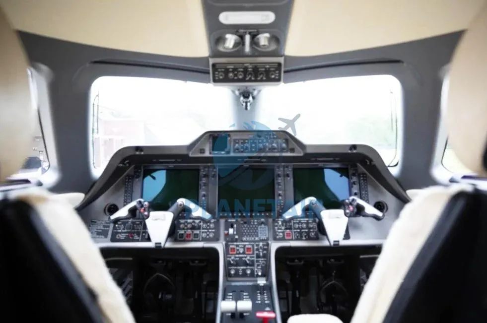 Cockpit and instrument panel of a 2012 Embraer Phenom 100.