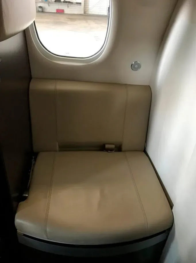 Cabin interior of a 2013 Embraer Phenom 100.