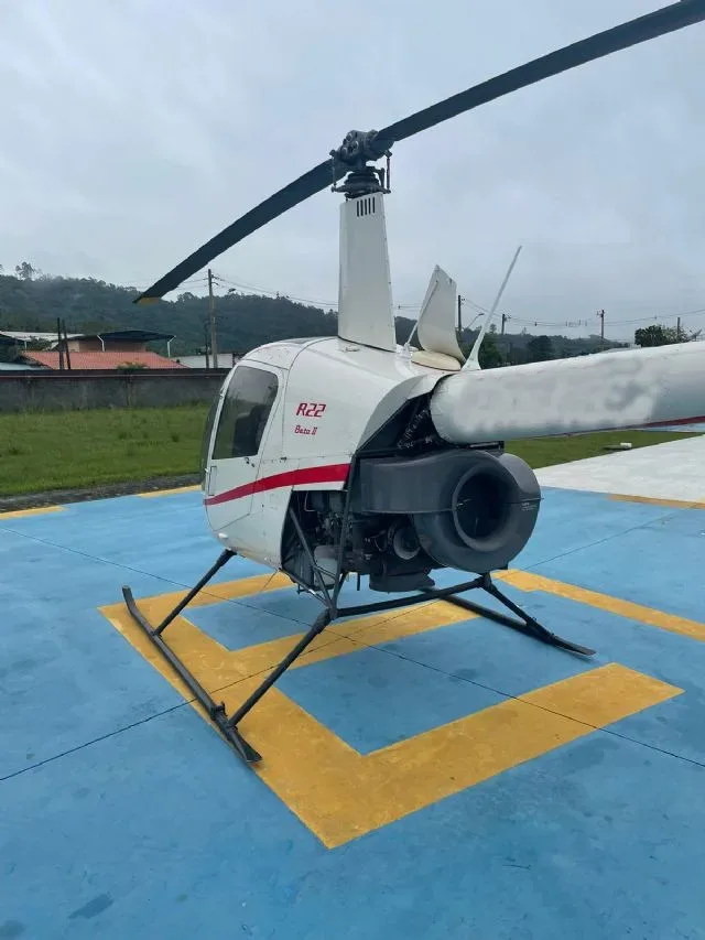Exterior view of a 2012 Robinson R22 Beta II.