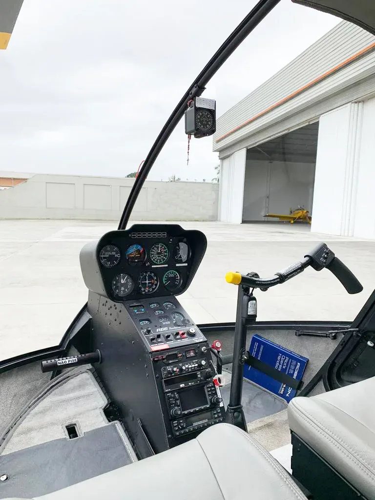 Cockpit and instrument panel of a 2012 Robinson R66 Turbine.