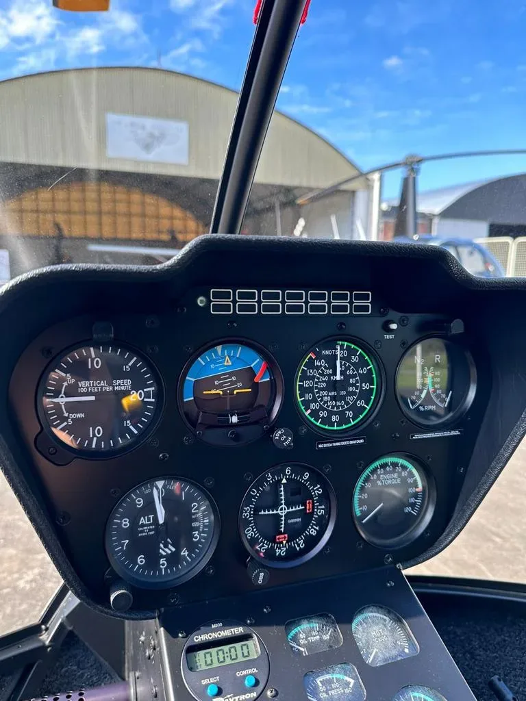 Cockpit and instrument panel of a 2012 Robinson R66 Turbine.