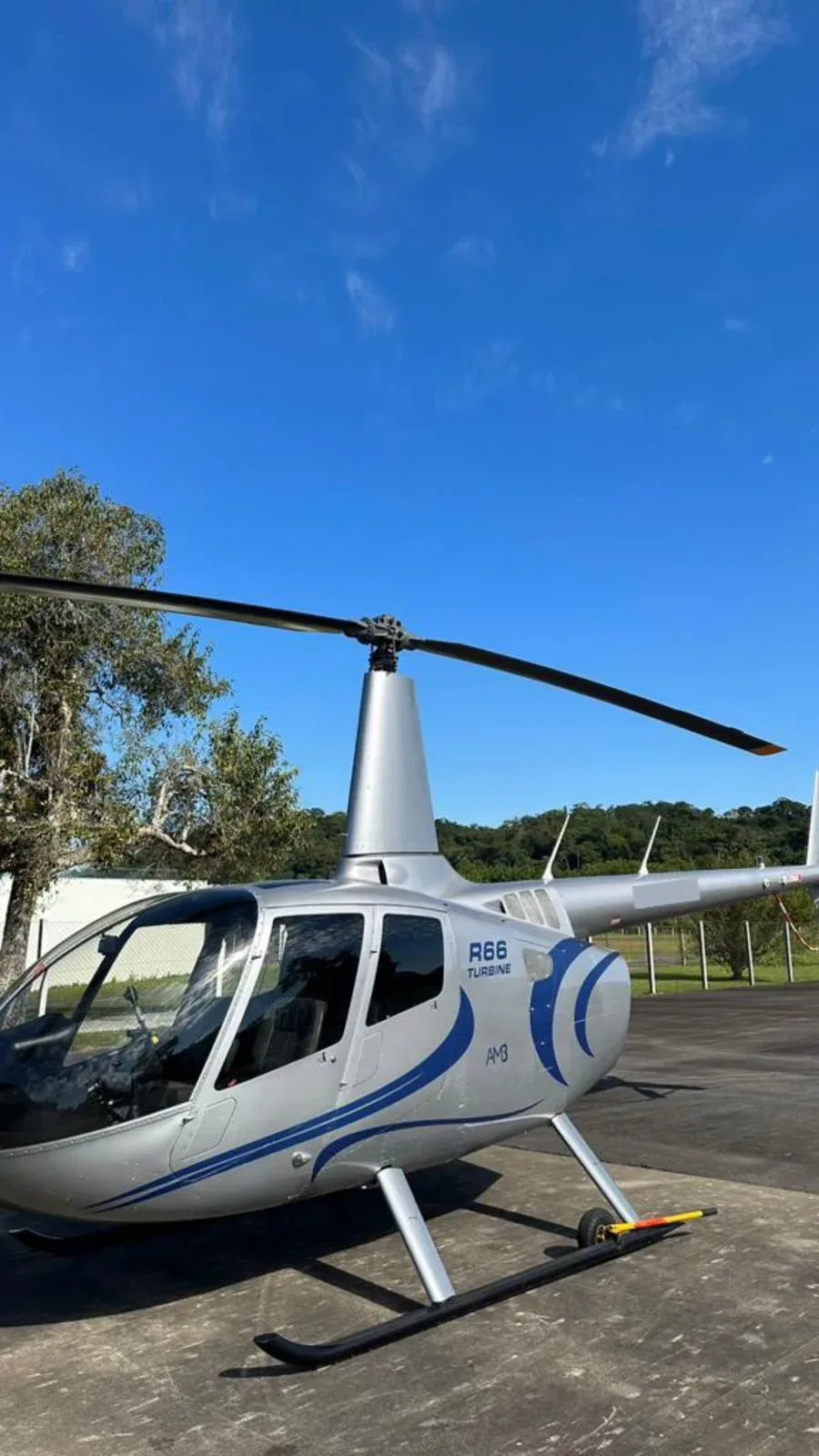 Exterior view of a 2012 Robinson R66 Turbine.