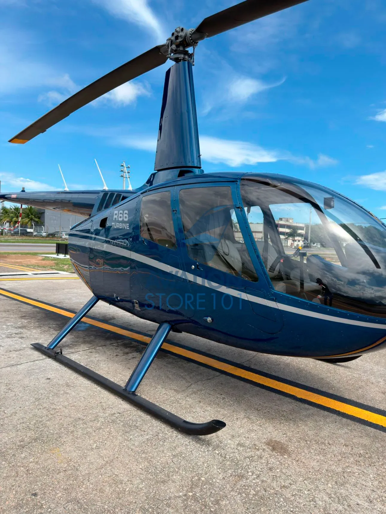 Exterior view of a 2013 Robinson R66 Turbine.