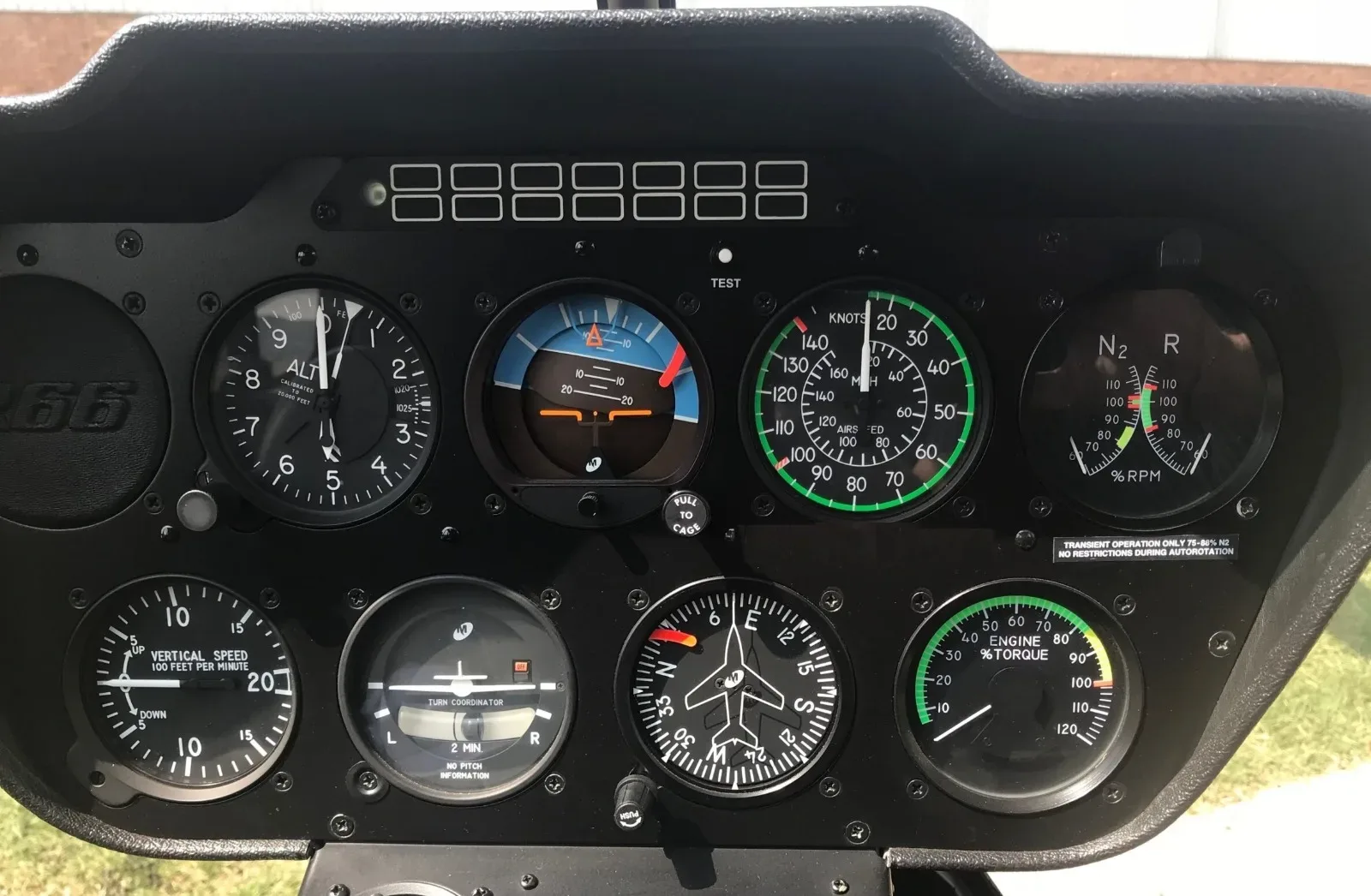 Cockpit and instrument panel of a 2013 Robinson R66 Turbine.