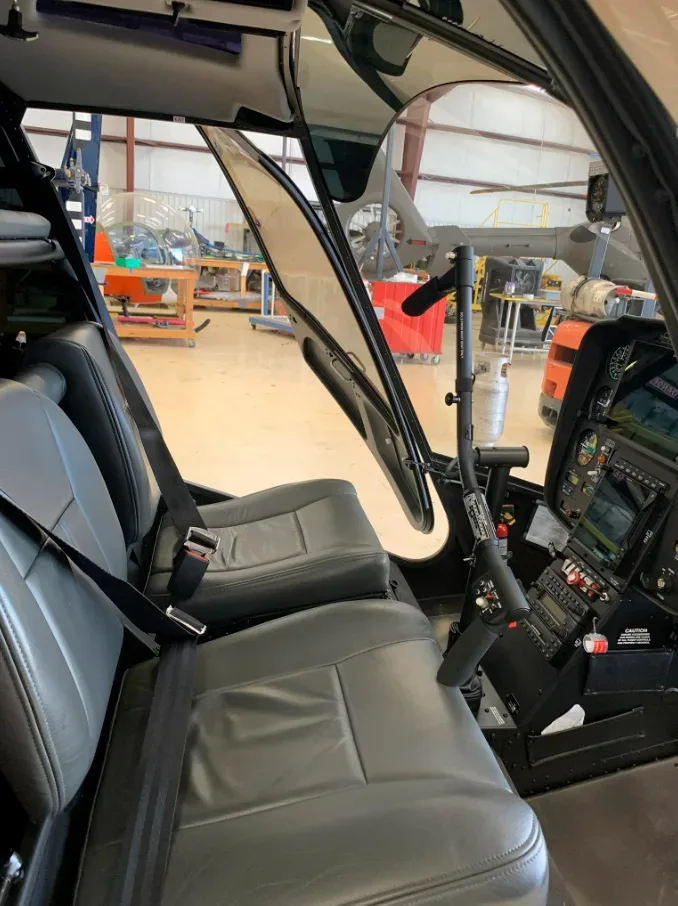 Cockpit and instrument panel of a 2021 Robinson R66 Turbine.