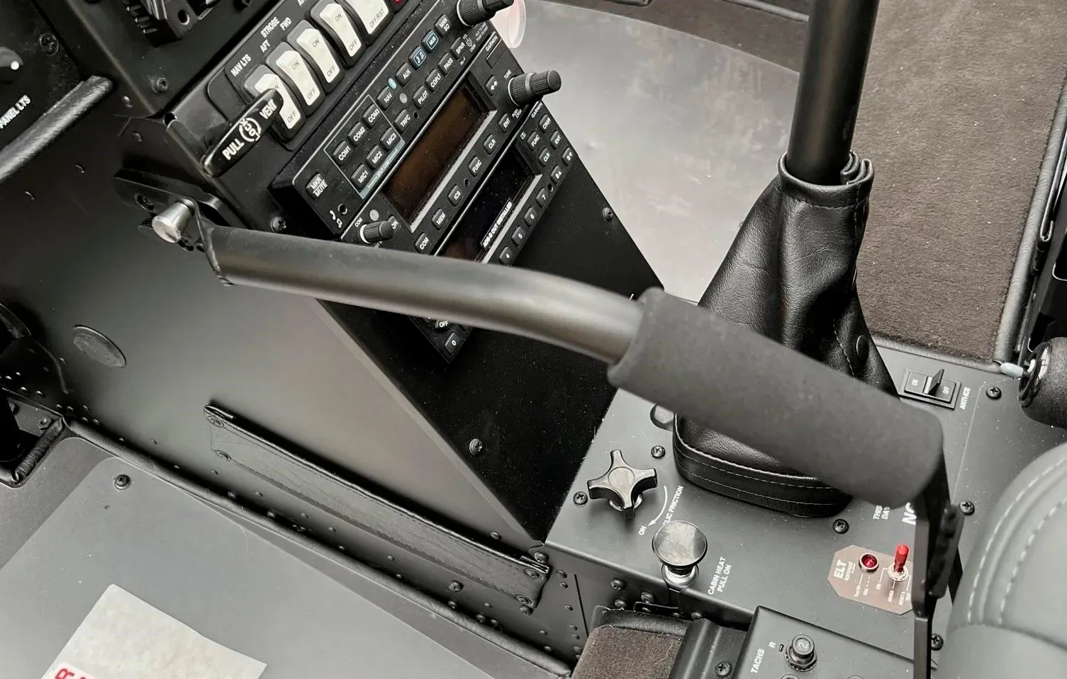Cockpit and instrument panel of a 2022 Robinson R66 Turbine.