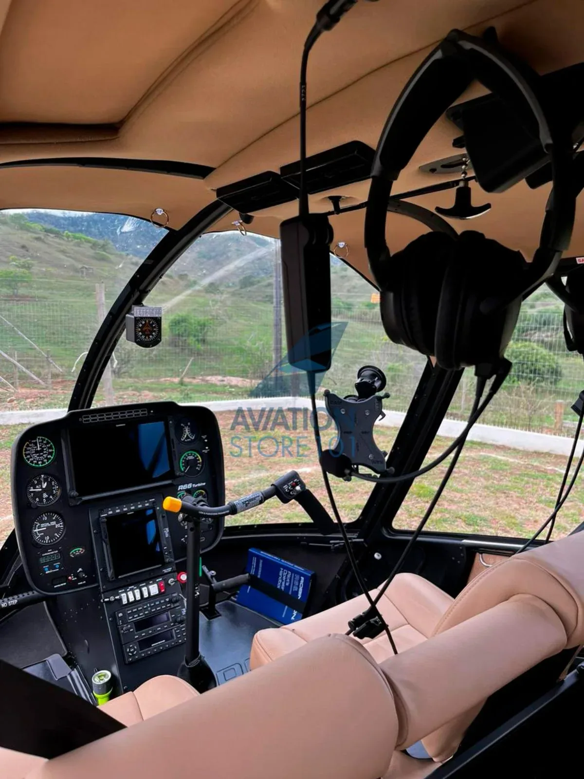 Cockpit and instrument panel of a 2023 Robinson R66 Turbine.