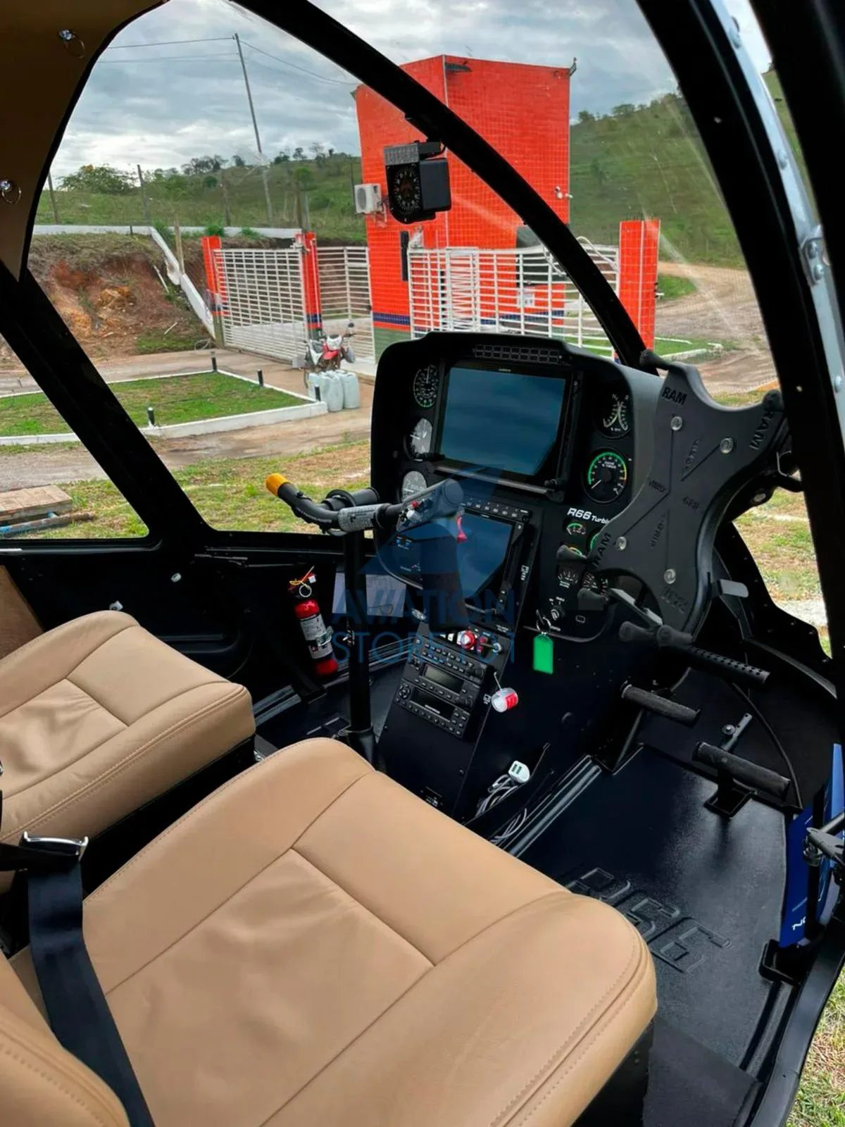 Cockpit and instrument panel of a 2023 Robinson R66 Turbine.