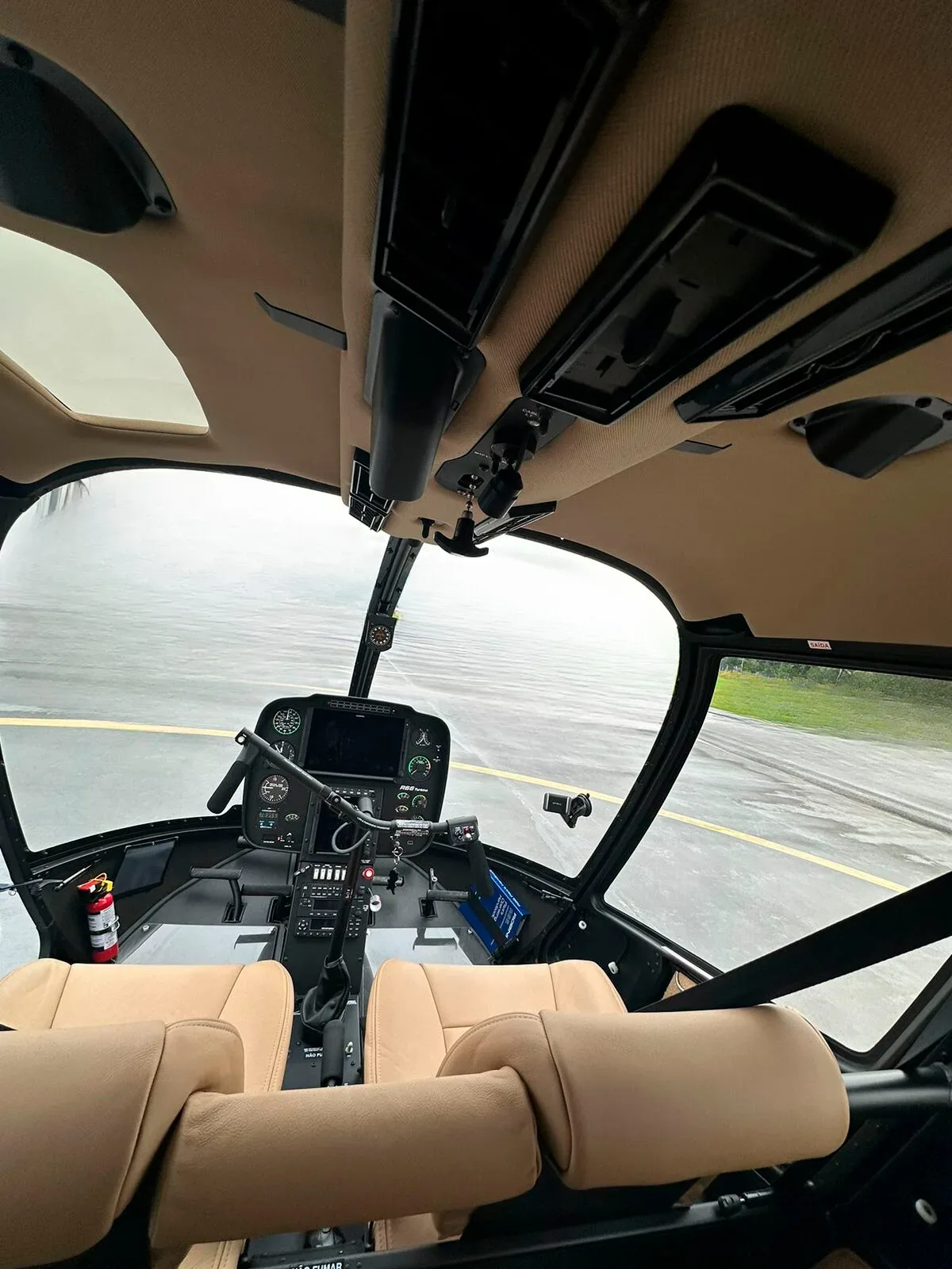 Cockpit and instrument panel of a 2023 Robinson R66 Turbine.