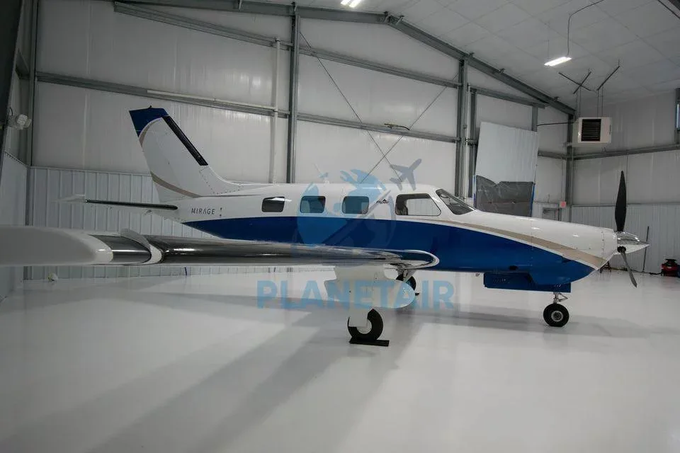 Exterior view of a 2014 Piper Mirage PA-46-350P.