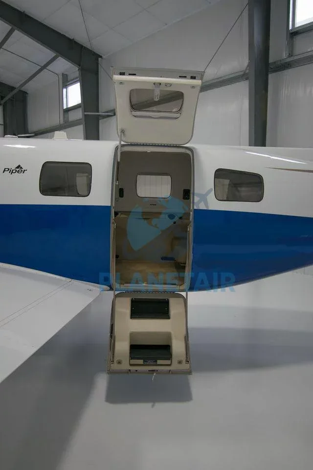 Exterior view of a 2014 Piper Mirage PA-46-350P.