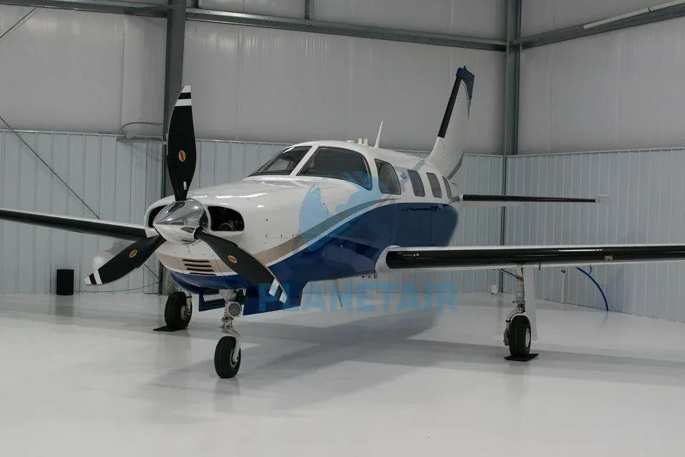 Exterior view of a 2014 Piper Mirage PA-46-350P.