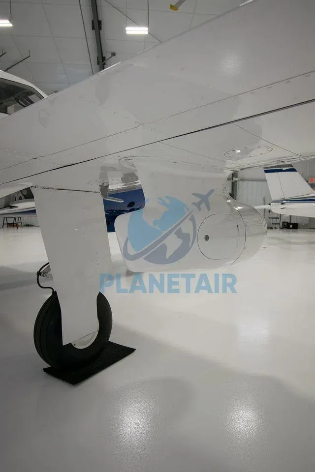 Exterior view of a 2014 Piper Mirage PA-46-350P.