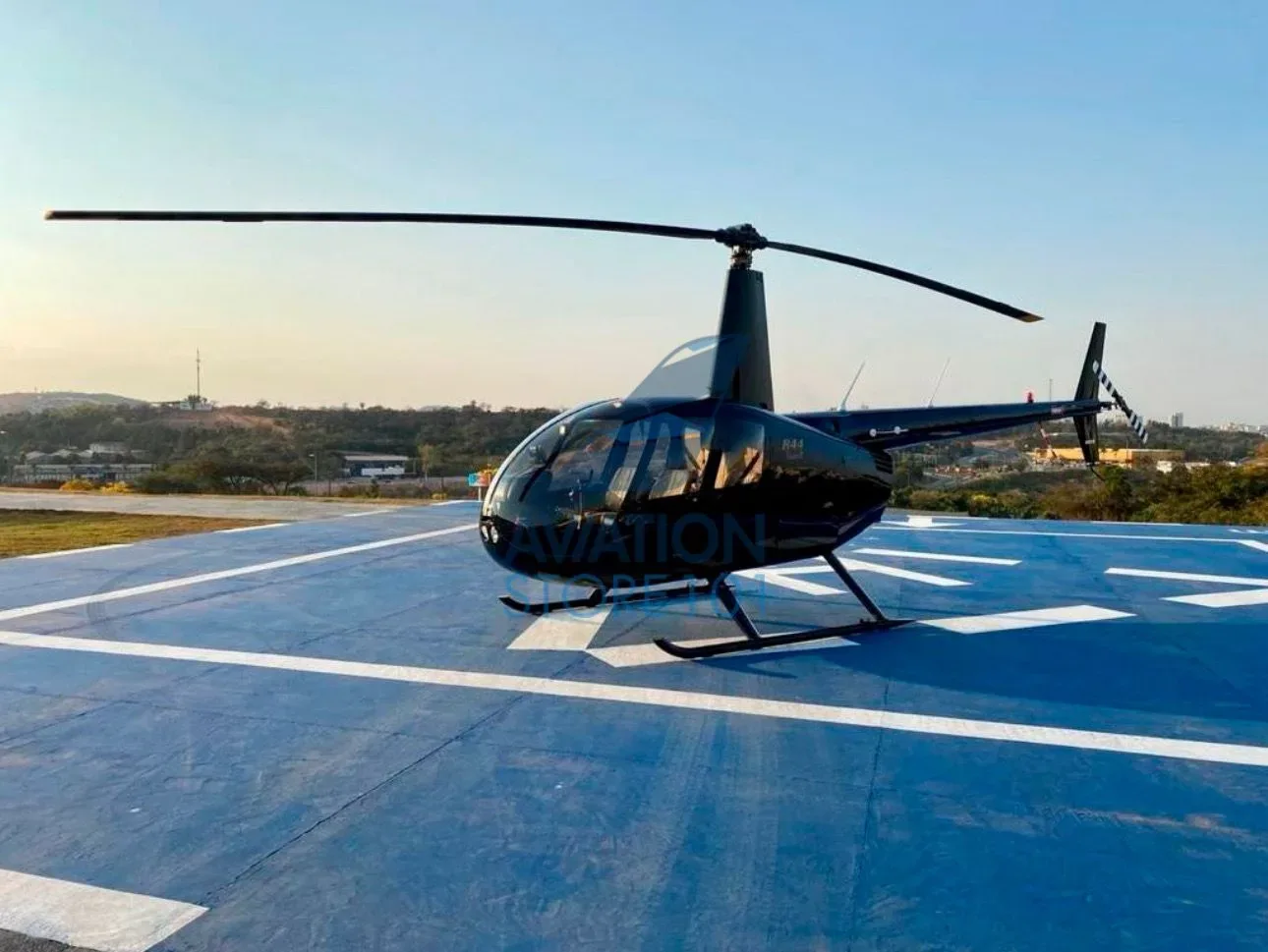 Exterior view of a 2006 Robinson R44 Raven II.