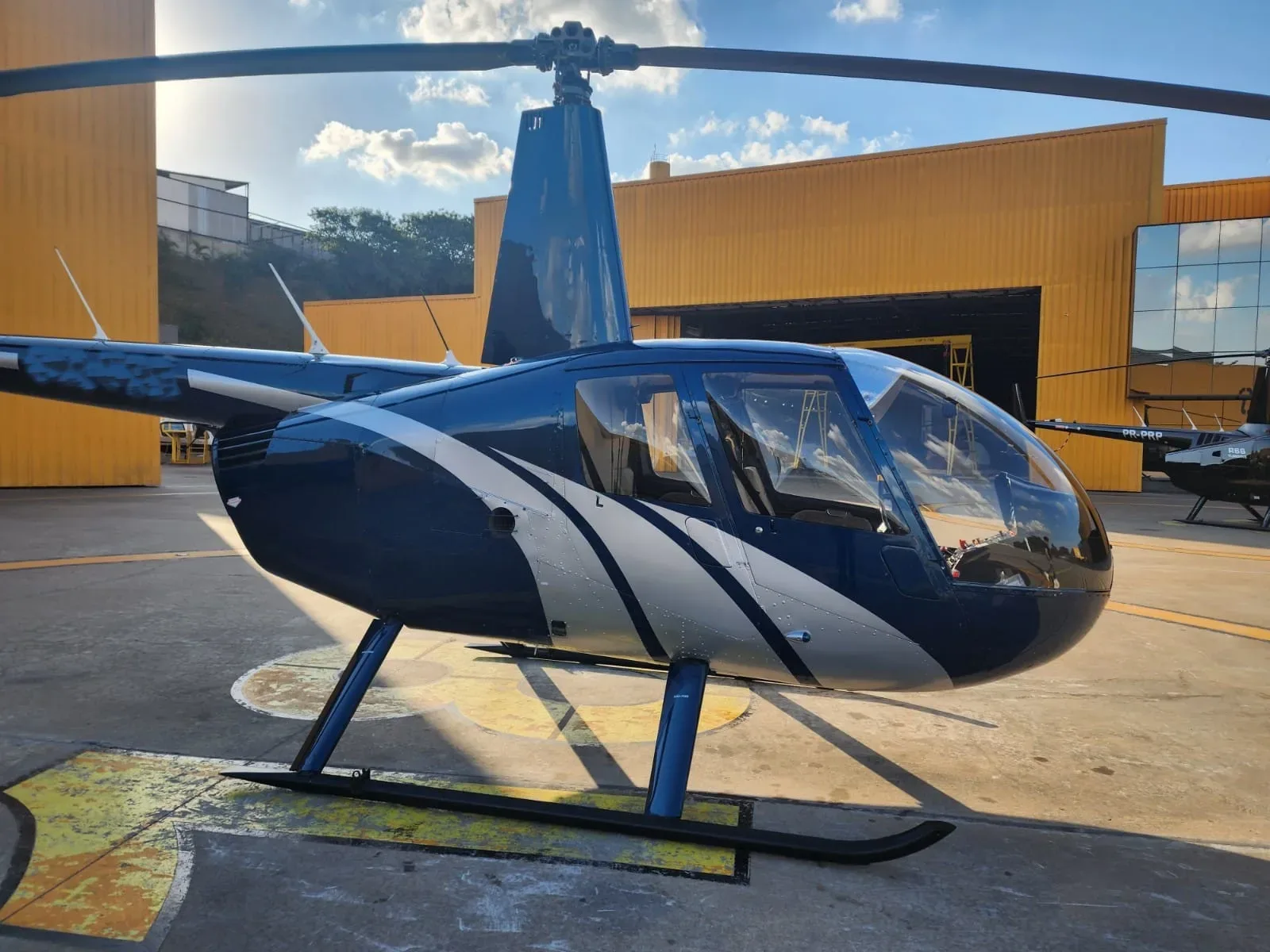 Exterior view of a 2008 Robinson R44 Raven II.