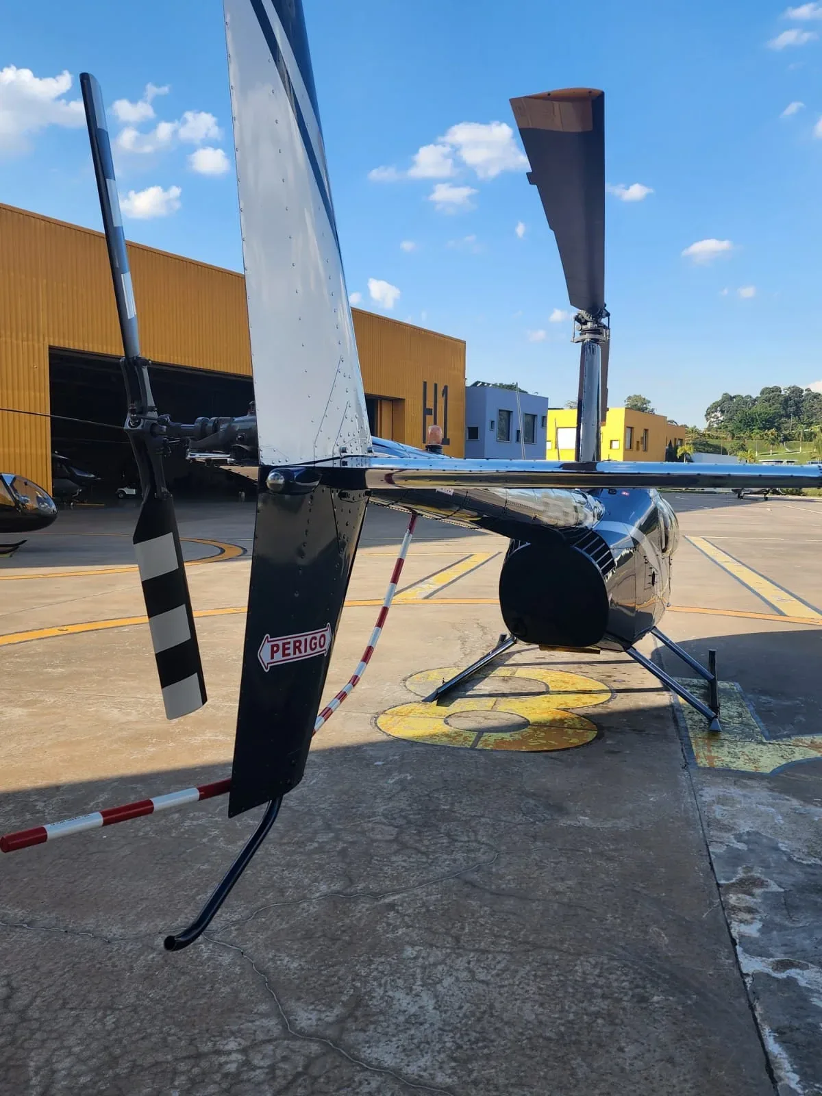 Exterior view of a 2008 Robinson R44 Raven II.
