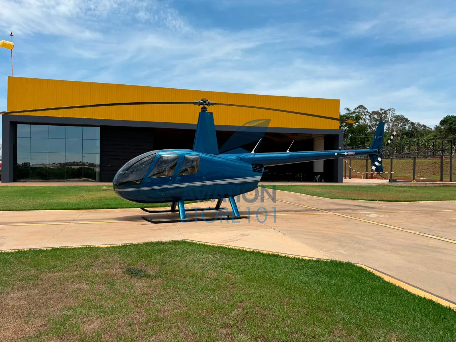 Exterior view of a 2008 Robinson R44 Raven II.