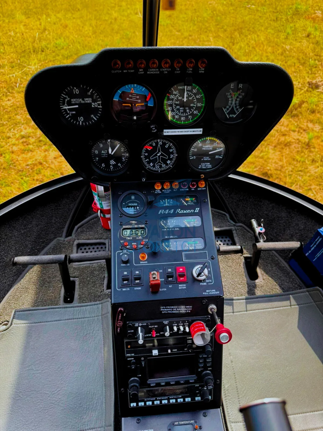 Cockpit and instrument panel of a 2009 Robinson R44 Raven II.
