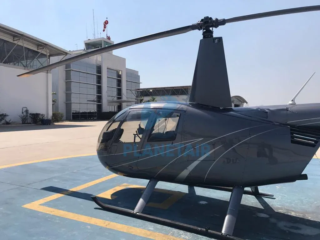 Exterior view of a 2010 Robinson R44 Raven II.