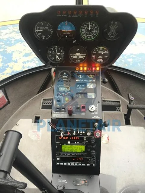 Cockpit and instrument panel of a 2010 Robinson R44 Raven II.