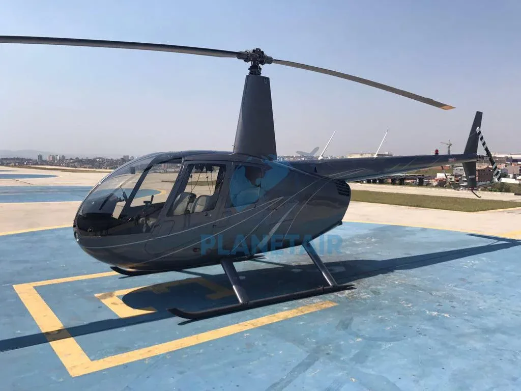 Exterior view of a 2010 Robinson R44 Raven II.