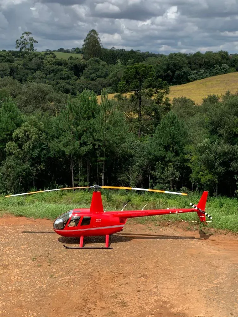 Exterior view of a 2011 Robinson R44 Raven II.