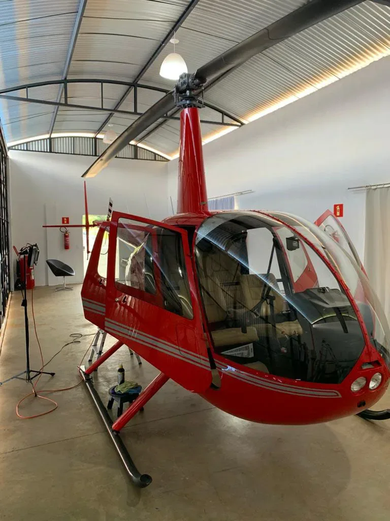 Exterior view of a 2011 Robinson R44 Raven II.