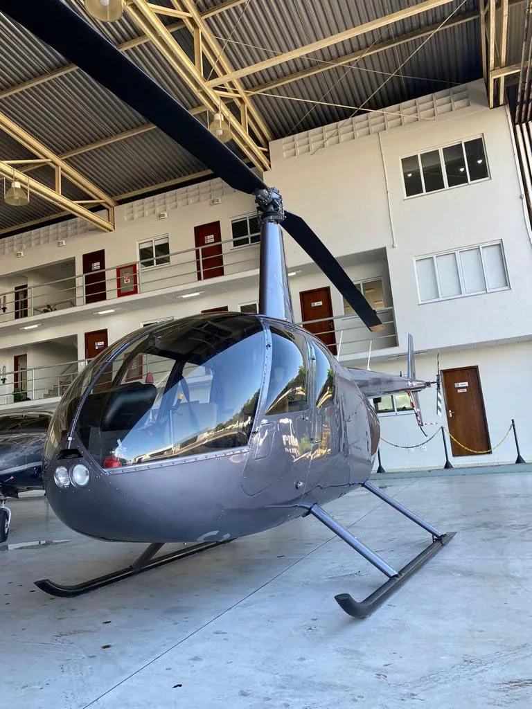 Exterior view of a 2013 Robinson R44 Raven II.