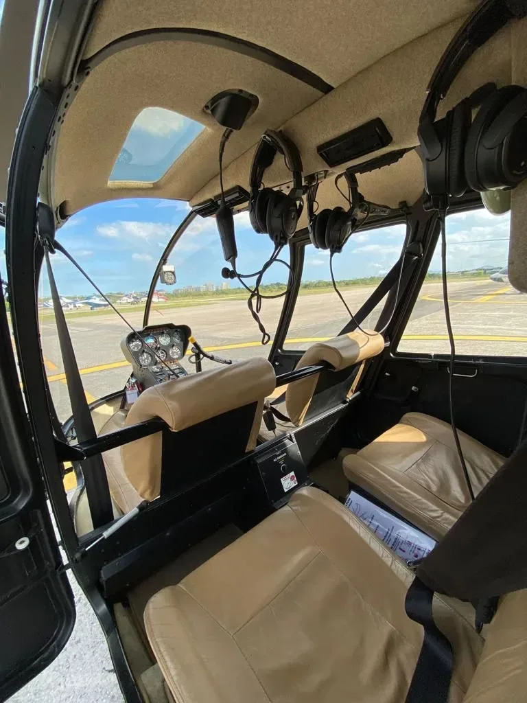 Cockpit and instrument panel of a 2013 Robinson R44 Raven II.