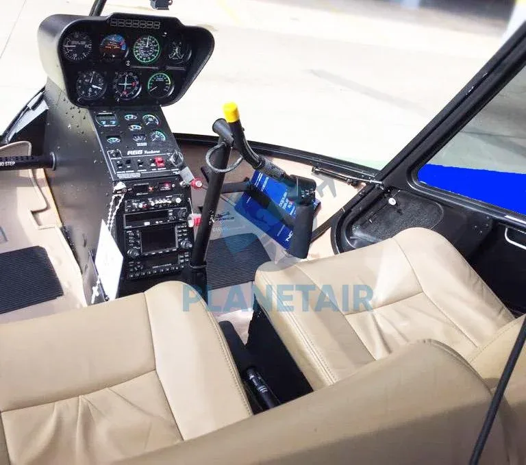Cockpit and instrument panel of a 2013 Robinson R66 Turbine.