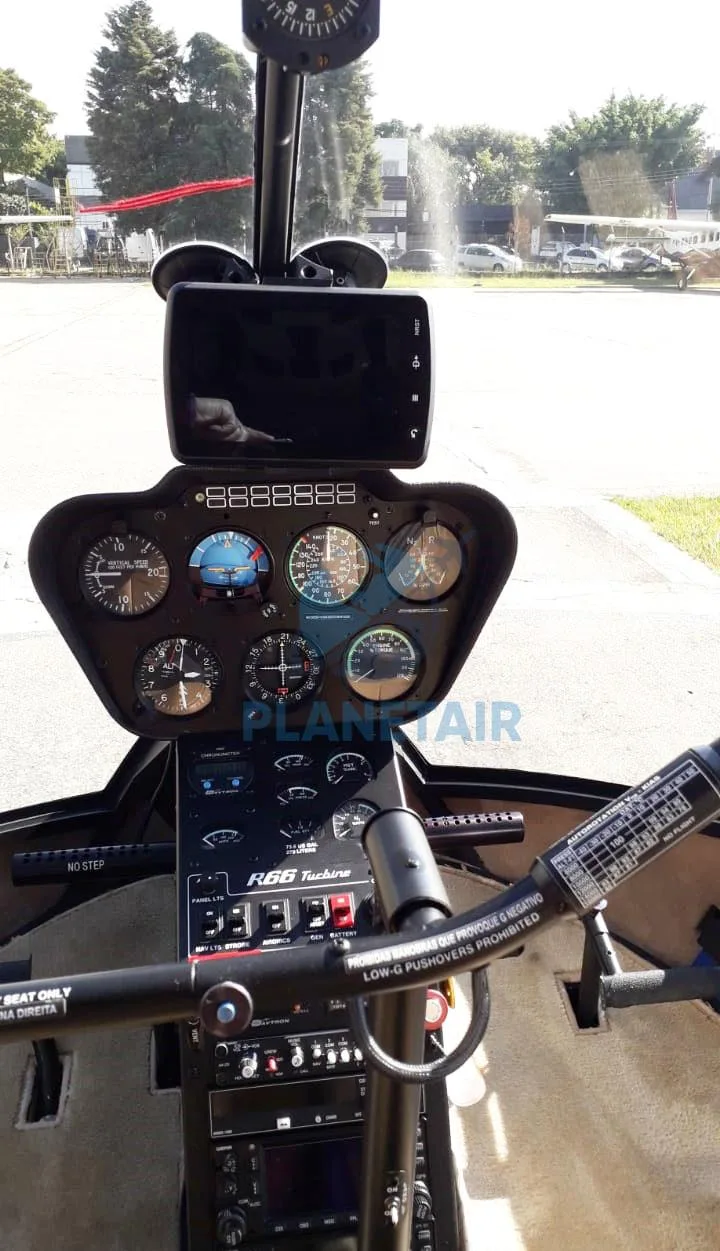 Cockpit and instrument panel of a 2013 Robinson R66 Turbine.