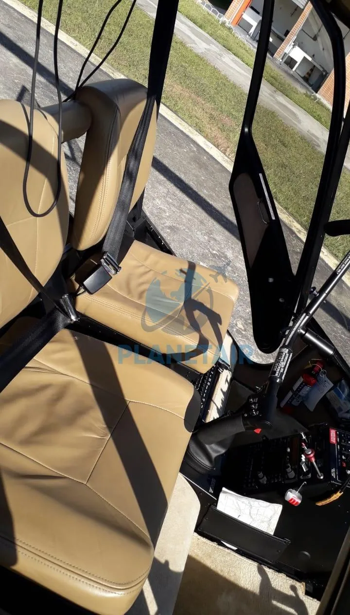Cockpit and instrument panel of a 2013 Robinson R66 Turbine.