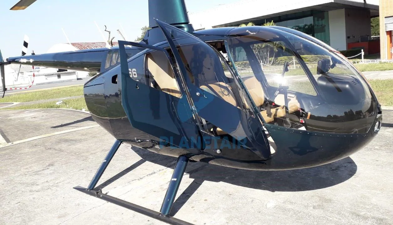 Exterior view of a 2013 Robinson R66 Turbine.