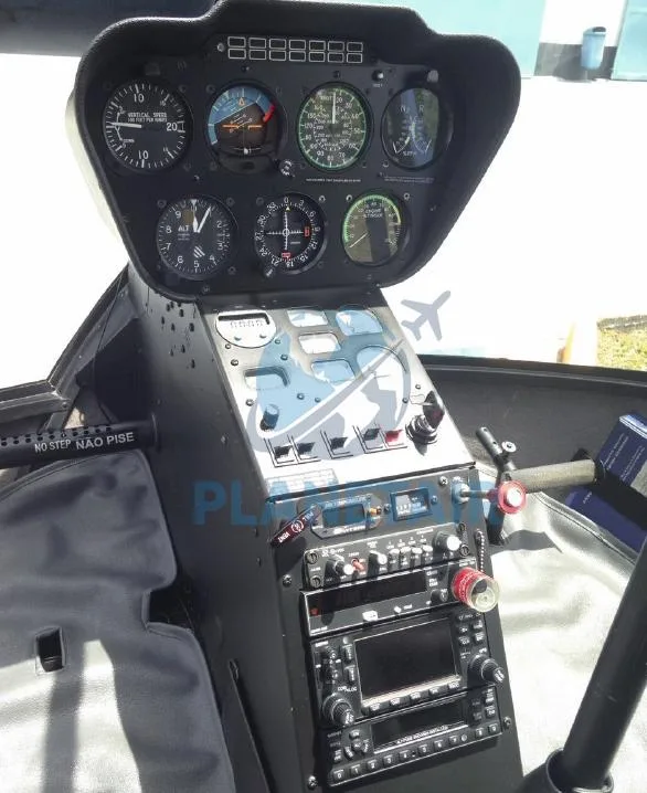 Cockpit and instrument panel of a 2014 Robinson R66 Turbine.